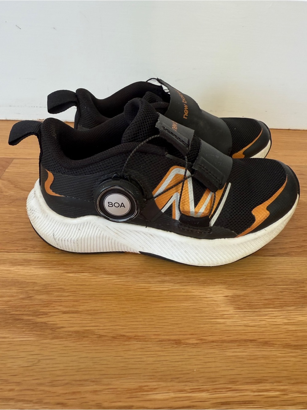 New Balance Kids Black and Orange BOA Sneakers